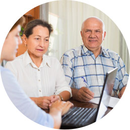 Couple talking to a Care Advisor about a modular cottage or home addition